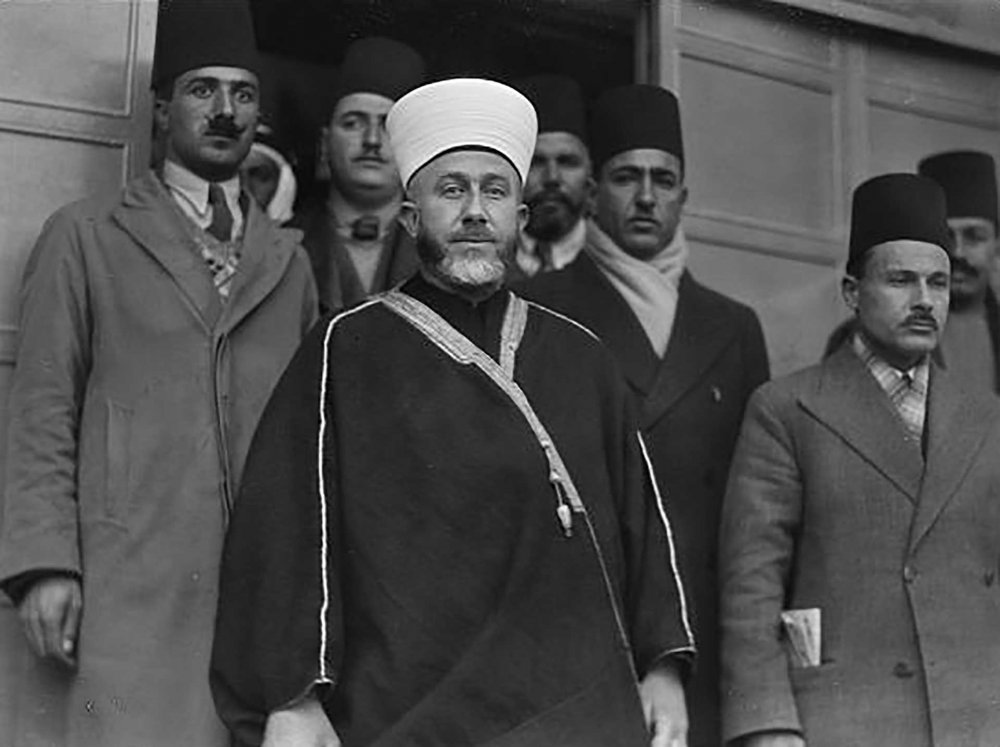 The Grand Mufti, Hajj Amin al-Husseini, leaving the offices of the Palestine Royal Commission after giving evidence, Jerusalem, 1937