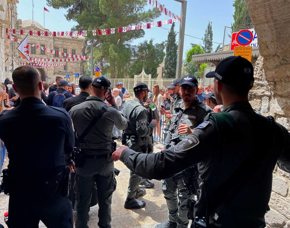 The Holy Fire procession during Easter week 2022 is blocked by Israeli police, who spread out through the Armenian Quarter of Jerusalem’s Old City.