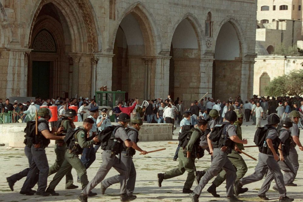The Second Palestinian Intifada erupts on September 28, 2000, after Ariel Sharon storms the al-Aqsa Mosque compound.