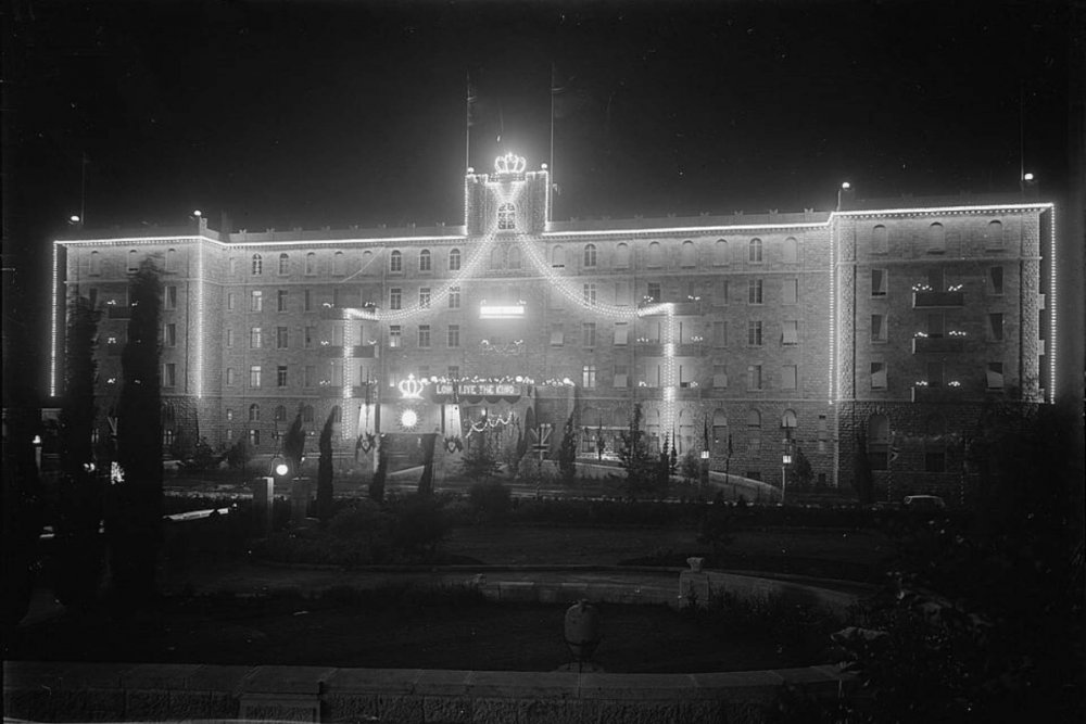 To celebrate the coronation of King George VI, the King David Hotel is decked with lights, topped by a crown, May 12, 1937.