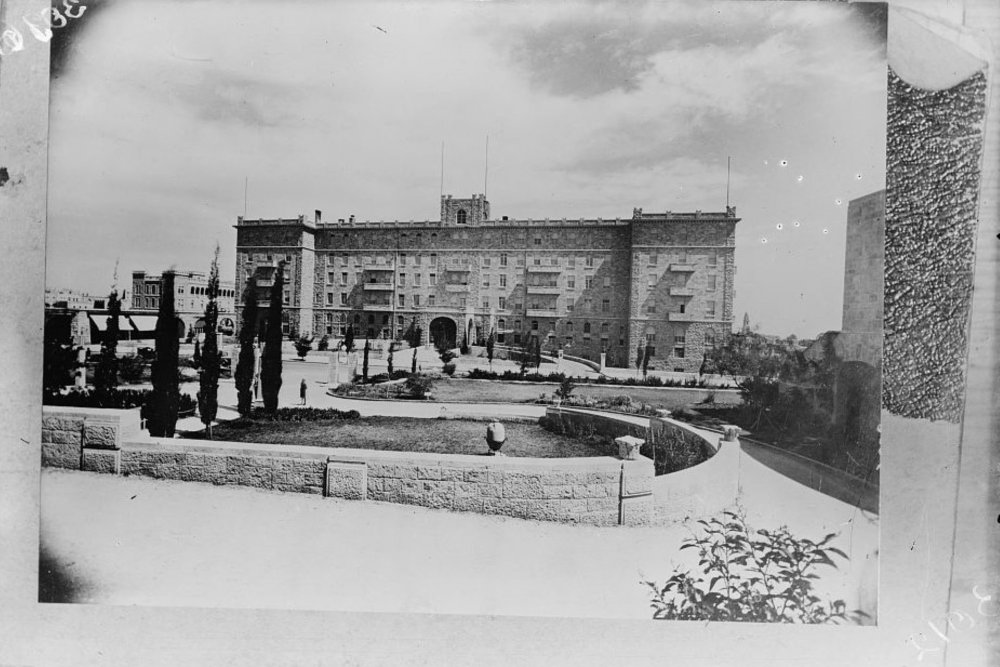 Jerusalem’s King David Hotel is in the background; in the foreground are the grounds and a few trees