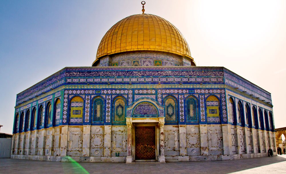 The exterior of Jerusalem's Dome of the Rock, viewed from the surrounding Al-Aqsa compound courtyard.