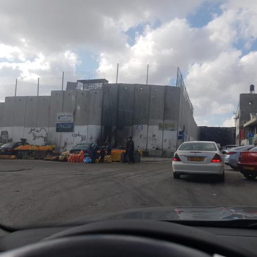Cars queue at the checkpoint entering Bethlehem