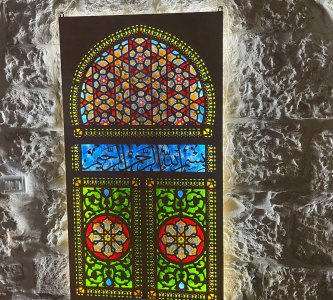 Window in arabesque design by Azzam Abu Saud that replicates the design of al-Aqsa Mosque windows