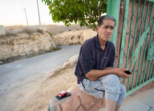 Al-Walaja resident Omar Hajajla speaking outside his home, November 2021
