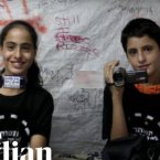 Screenshot from a 2011 video by The Guardian about Muna and Mohammed al-Kurd