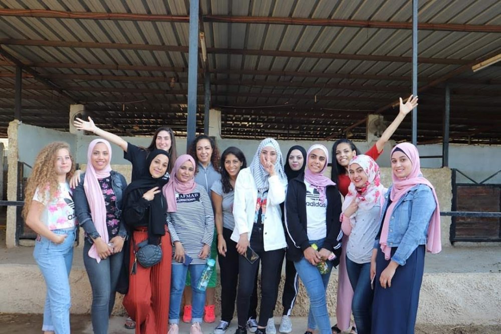 Ashira Ramadan, Yoga healer, with Palestinian activist Ahed Tamimi and other female former prisoners, 2019