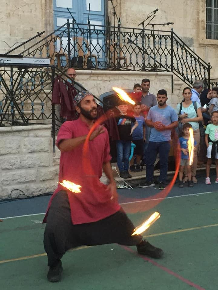 Flamethrower Ahmad Jubeh performs at the “Abwab al-Khareef” arts festival in the Old City of Jerusalem