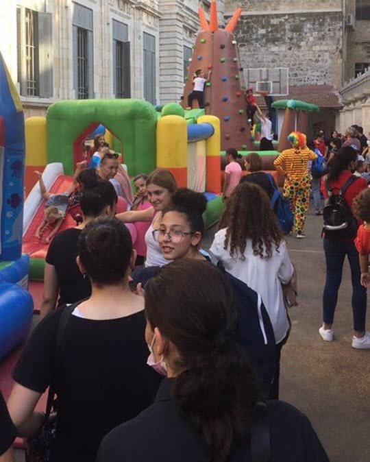 Children play games at the Abwab al-Khareef arts festival in Jerusalem, 2021