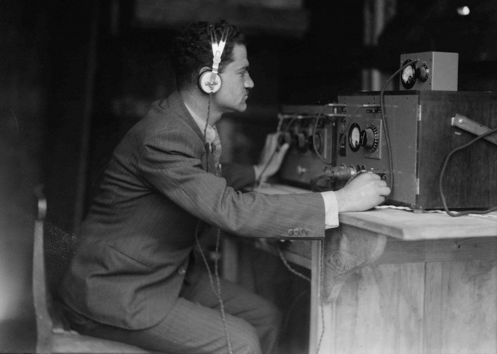 Man broadcasting for the Palestine Broadcasting Service, a Jerusalem radio station, 1936