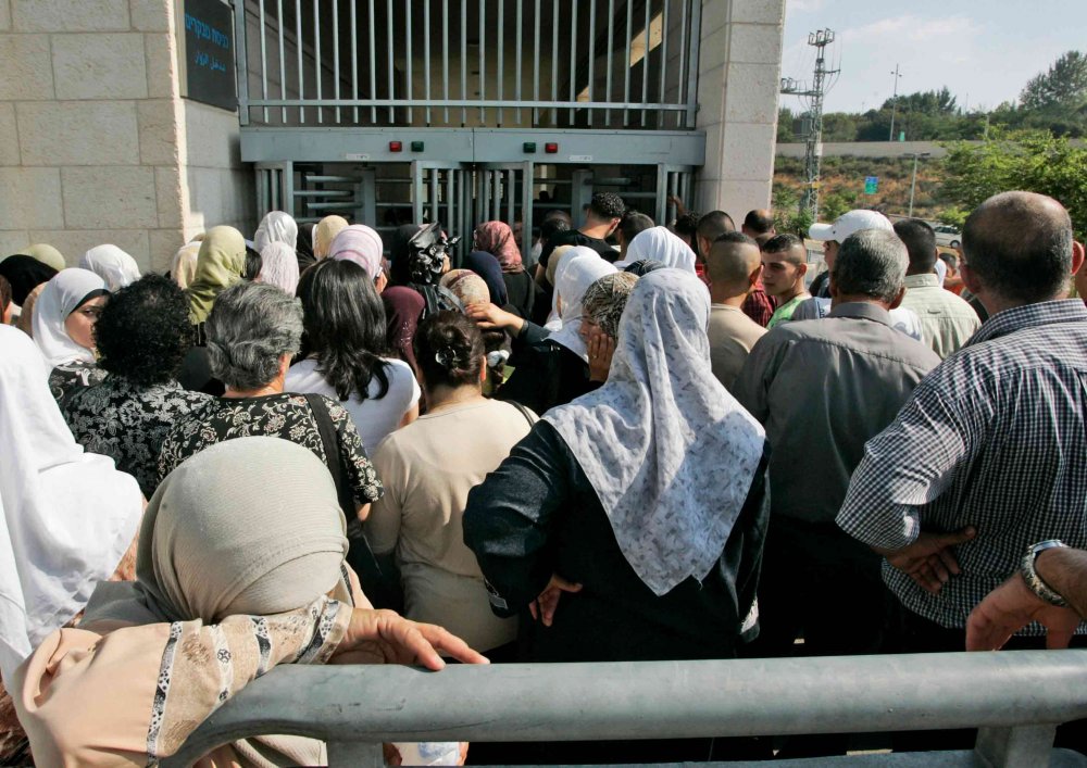 Palestinians queue at the Israeli Ministry of Interior office in Wadi al-Joz in East Jerusalem, 2008