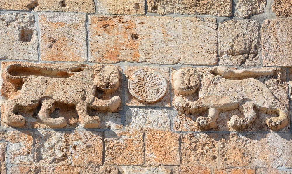 Close-up of one of the two pairs of lions that are on either side of the Lion's Gate arch in Jerusalem's Old City