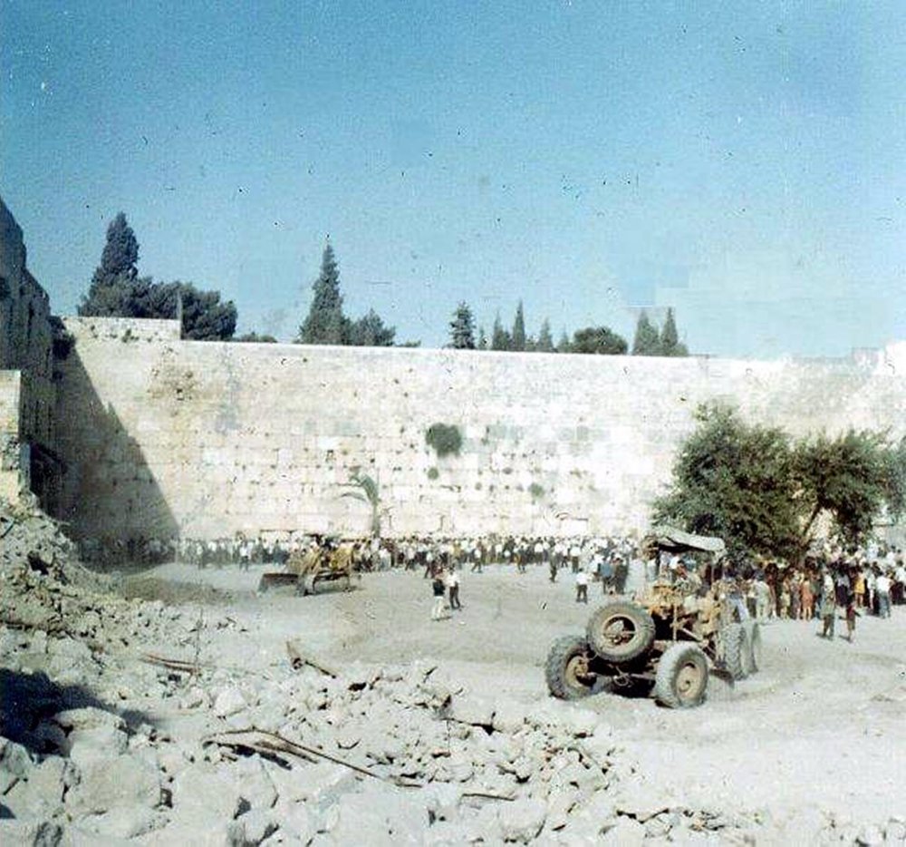 Israeli bulldozers clear the rubble of the destroyed Moroccan Quarter, June 1967