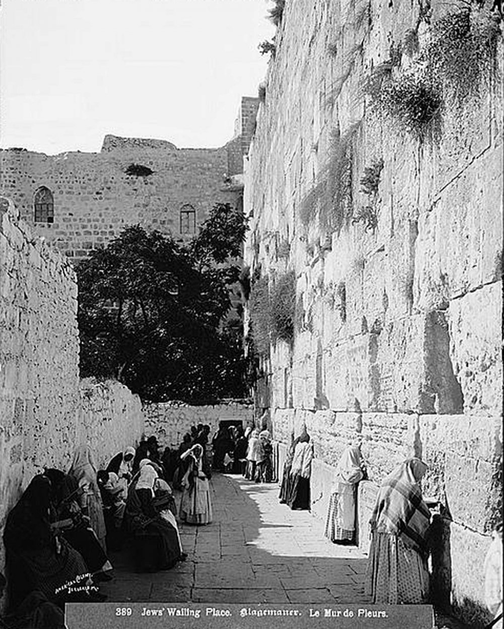 Jewish worshippers in the narrow space between the Moroccan Quarter and the Western (al-Buraq) Wall, 1900