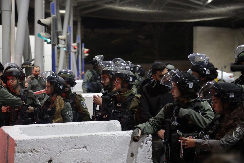 Israeli troops besiege the checkpoint to Shu'fat refugee camp after an attack on February 13, 2023