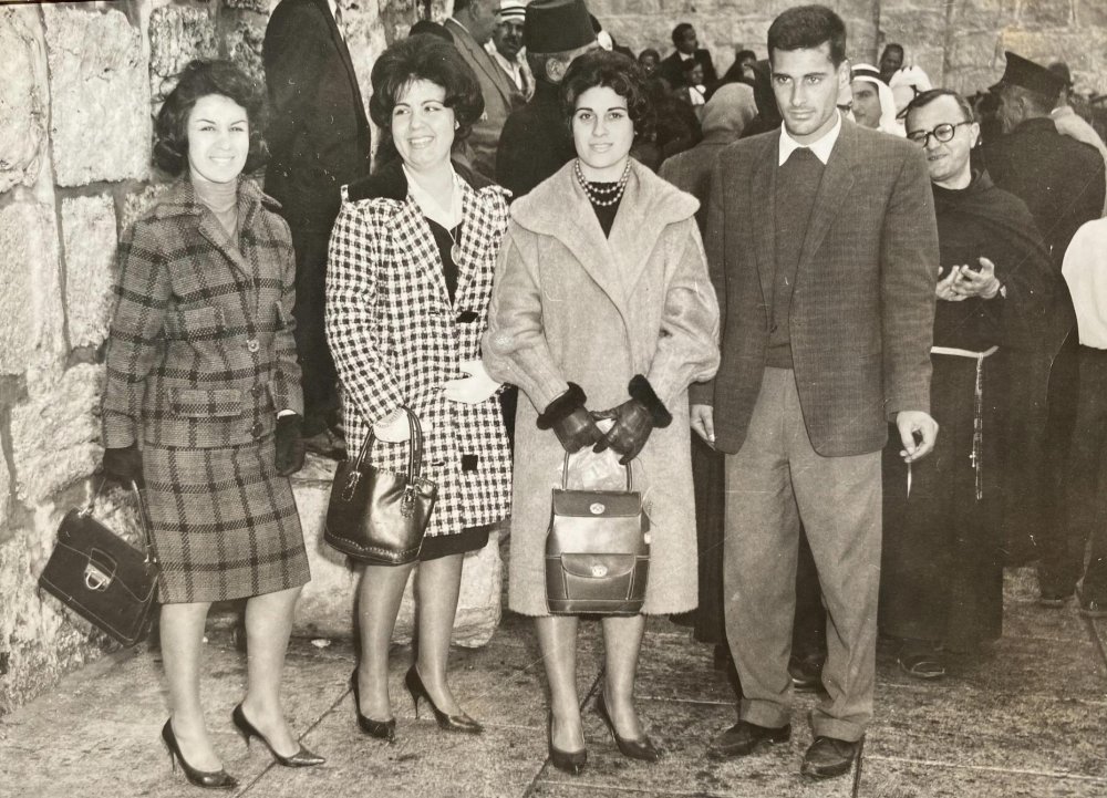 Jerusalem residents Nina Bazouzi and her brother at the Bethlehem Nativity Church plaza, 1961