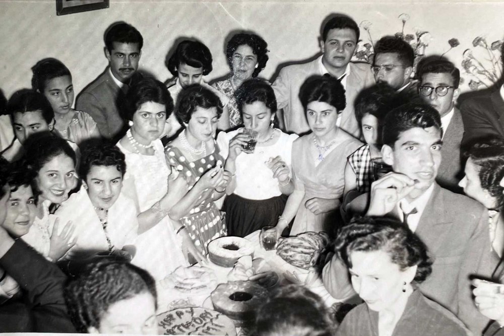 Jerusalem resident Nina Bazouzi and friends celebrate a birthday in Bethlehem, 1956 or 1957