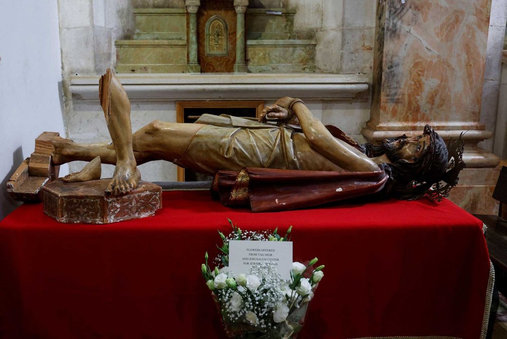 A statue of Jesus Christ, defaced and toppled, in the Church of the Flagellation, Jerusalem, February 2, 2023.