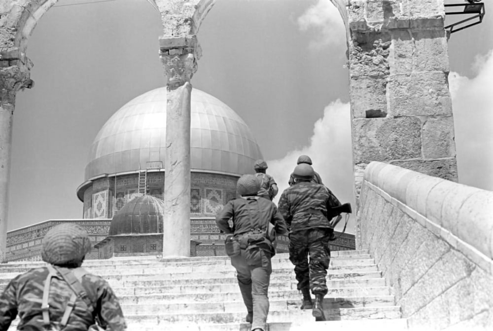 Israeli paratroopers storm the Haram al-Sharif complex upon occupying the eastern half of Jerusalem in 1967.
