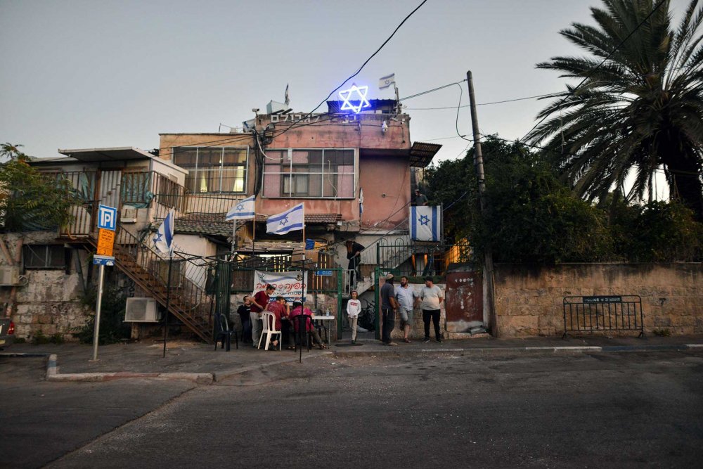 The home of the Ghawi family, Palestinians who were forcibly expelled by a decision of the Israeli Supreme Court in 2010, showed here over a decade later, adorned with Jewish symbols to flaunt the seizure.