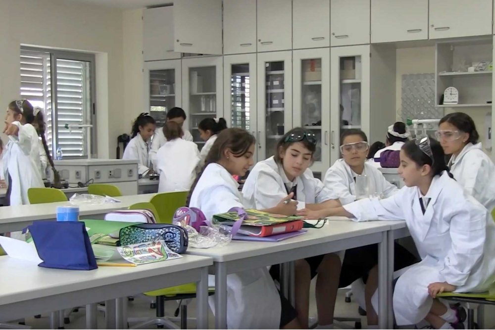 Girls in lab at Schmidt’s Girls College, East Jerusalem