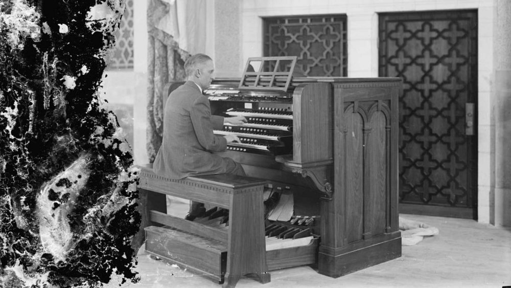 Man playing piano at the Jerusalem YMCA, early 1930s