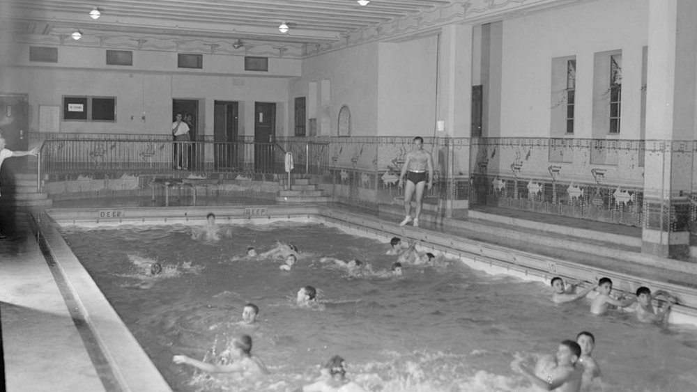 Boys enjoy the Jerusalem YMCA swimming pool in 1938