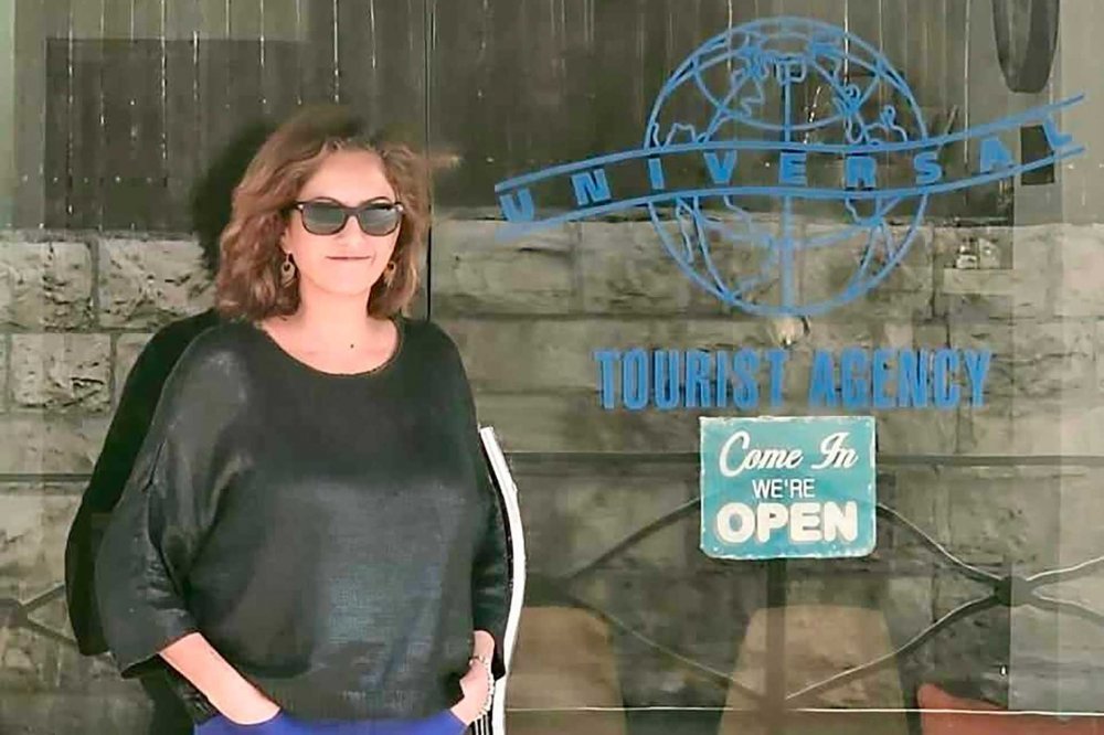 Margo Tarazi standing in front of her tourism business