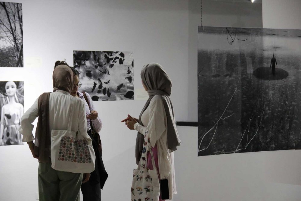 Viewers enjoy the art exhibit “Cold Water” by Michael Jabareen and Rasha al-Jundi as part of a weeklong festival of Palestinian culture in East Jerusalem in September 2023.