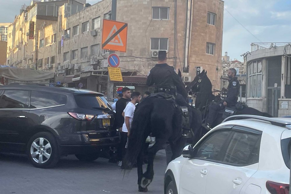 Israeli police mounted on horseback patrol Salah al-Din Street and intimidate Jerusalem residents, November 11, 2023.