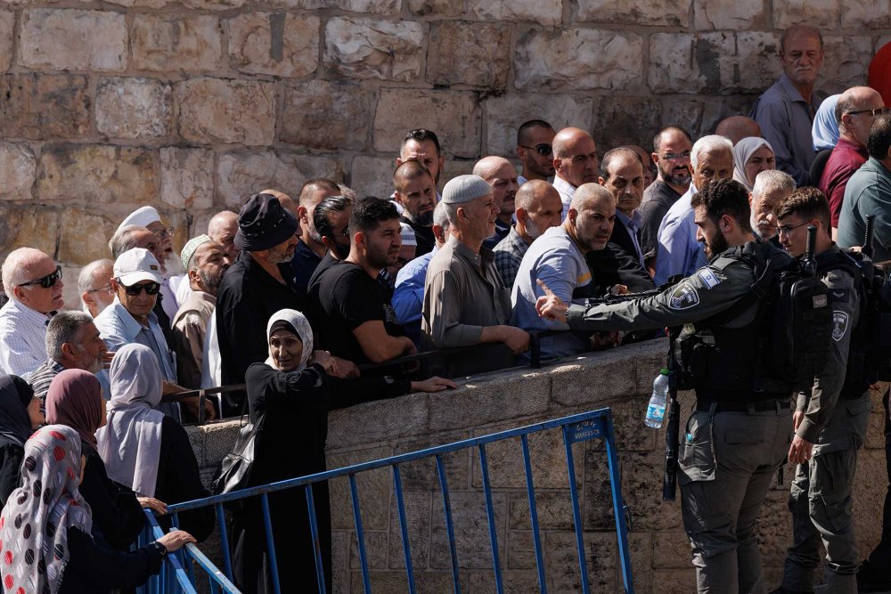 Palestinian Muslims wait to enter the Haram al-Sharif compound through the Lions’ Gate on Friday, November 3, 2023. Heavy restrictions were in effect on who was allowed to enter due to Israel’s war on Gaza.