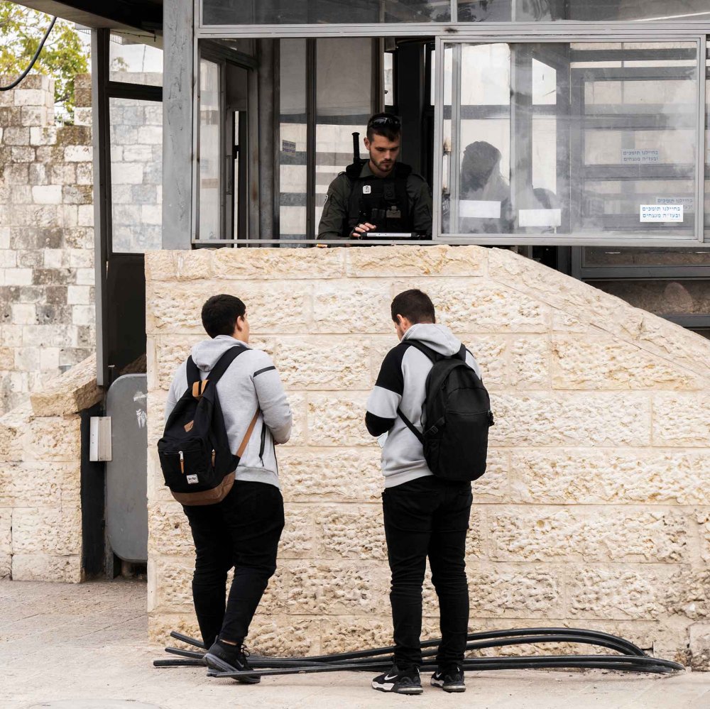 Israeli police singling out teenage Palestinian boys for questioning at the entrance point to the Damascus Gate, which leads into the Muslim Quarter of Jerusalem's Old City, November 22, 2023.