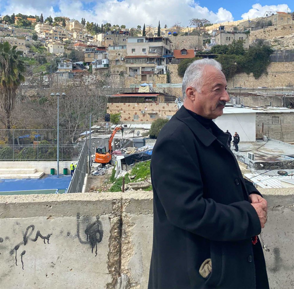Palestinian Fakhri Abu Diab stands near the site of his home in East Jerusalem that was demolished by the city on February 14, 2024.