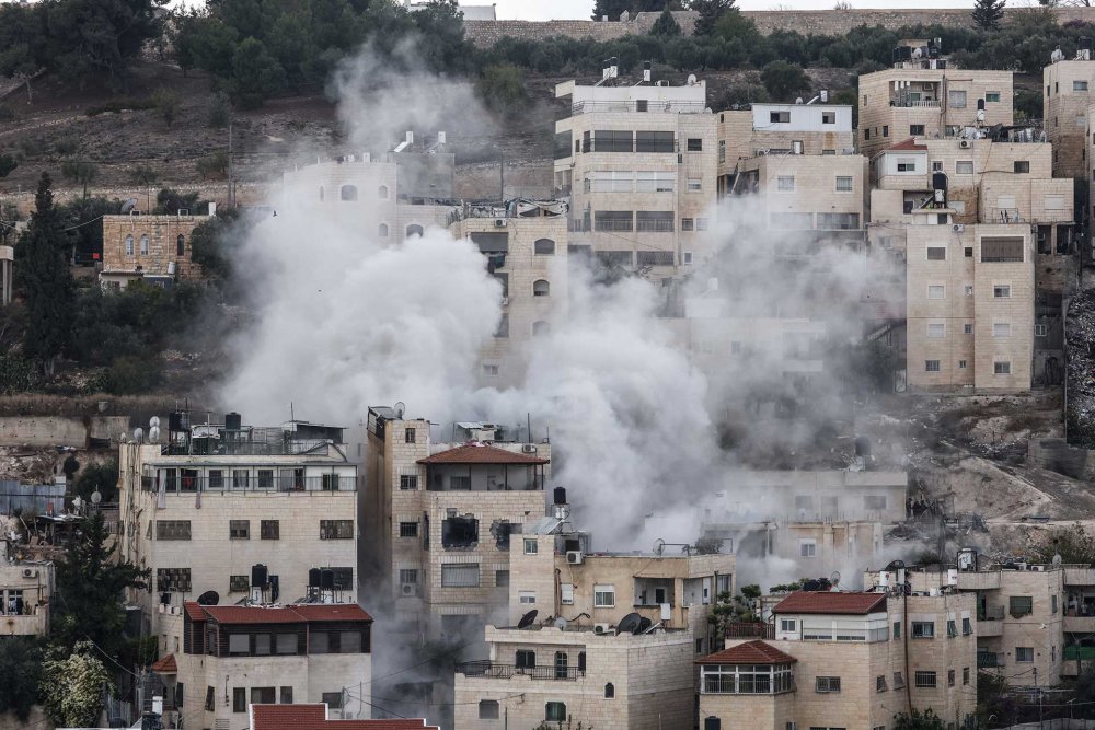 Israeli authorities demolish a Palestinian home in Silwan during the 2023 war on Gaza.