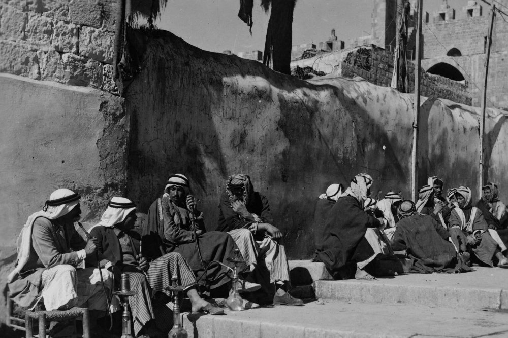 Palestinian laborers line up by the Damascus Gate in Jerusalem in anticipation of employment, January 1, 1925.