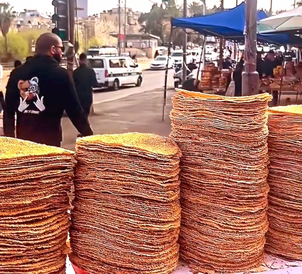 Stacks of barazeq on a mobile cart are hot sellers in Jerusalem’s Old City during Ramadan.