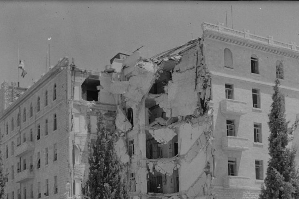 The southern wing of the King David Hotel is destroyed by timed explosives placed by the Irgun in the hotel’s basement, July 22, 1946.