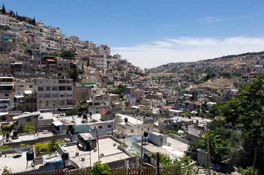The al-Bustan neighborhood in Silwan, foreground; to the left, the Batn al-Hawa neighborhood