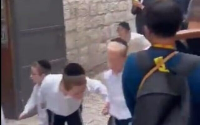 Radical Jews spit at Christian pilgrims in Jerusalem's Lions' Gate