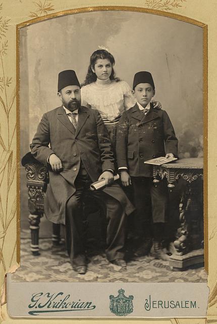 Portrait of Fedi Effendi el-Alami, mayor of Jerusalem from 1906 to 1909, with his daughter, Na‘amite, and son, Mousa Bey
