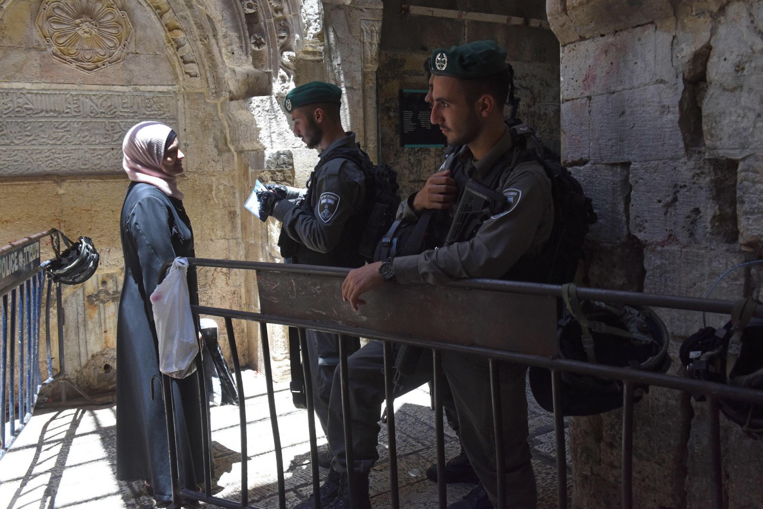 Israeli Border police checking a woman’s ID at a checkpoint in the Old City of Jerusalem, 2017