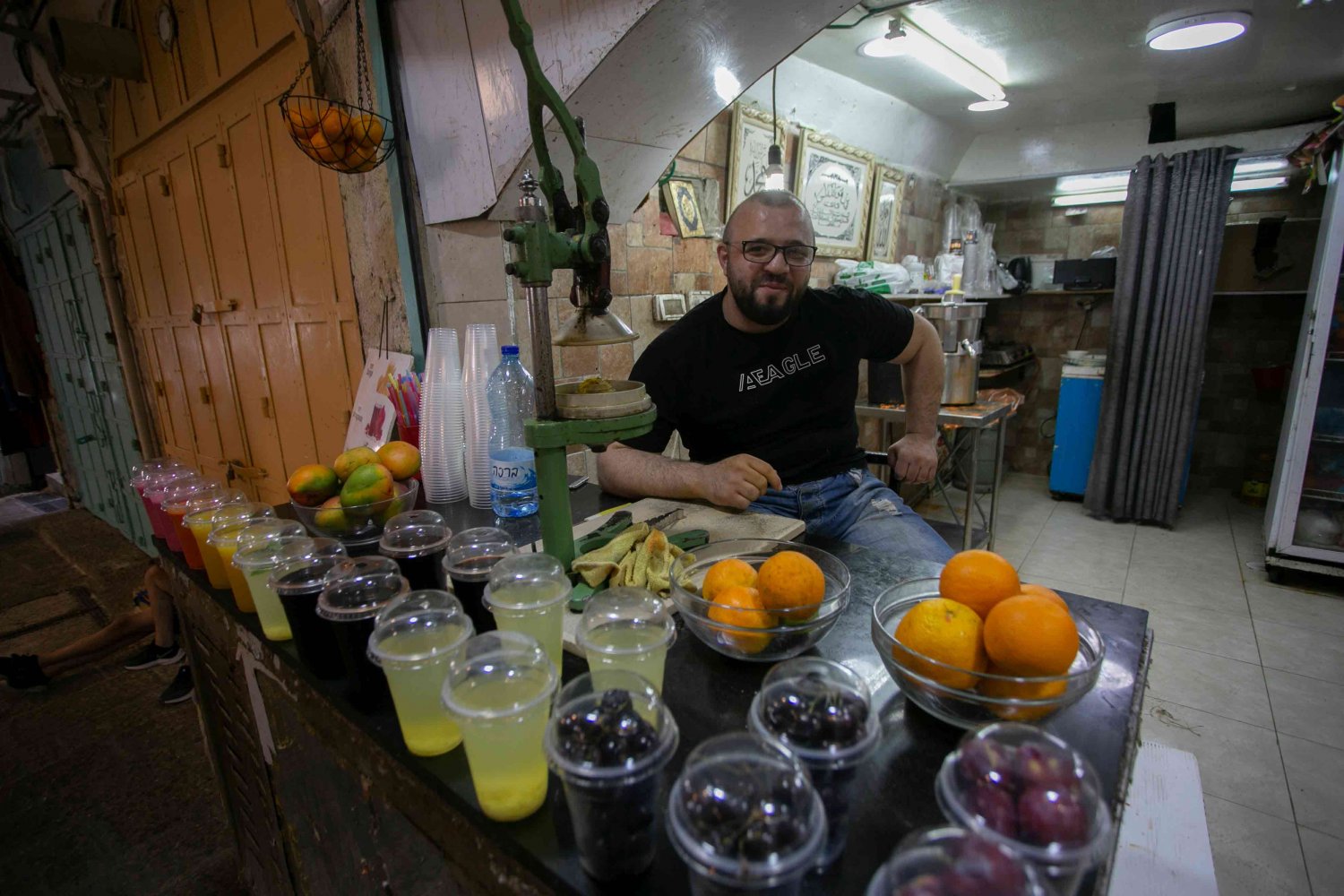 A juice seller in the Old City of Jerusalem, 2021