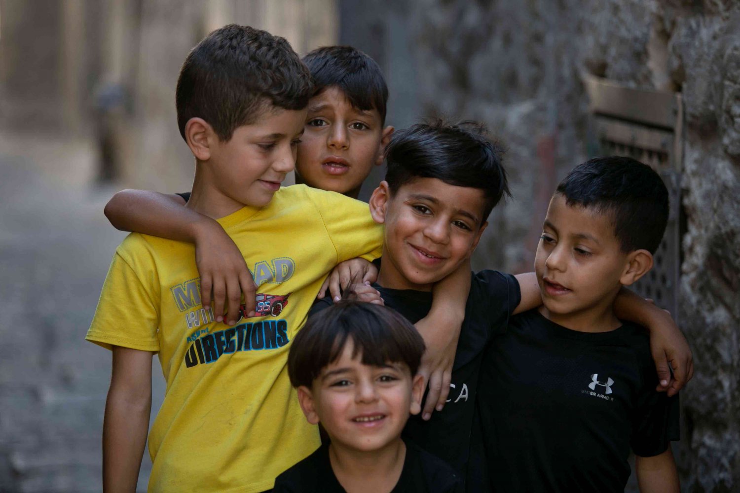 Palestinian boys hang out in Jerusalem's Old City, 2021