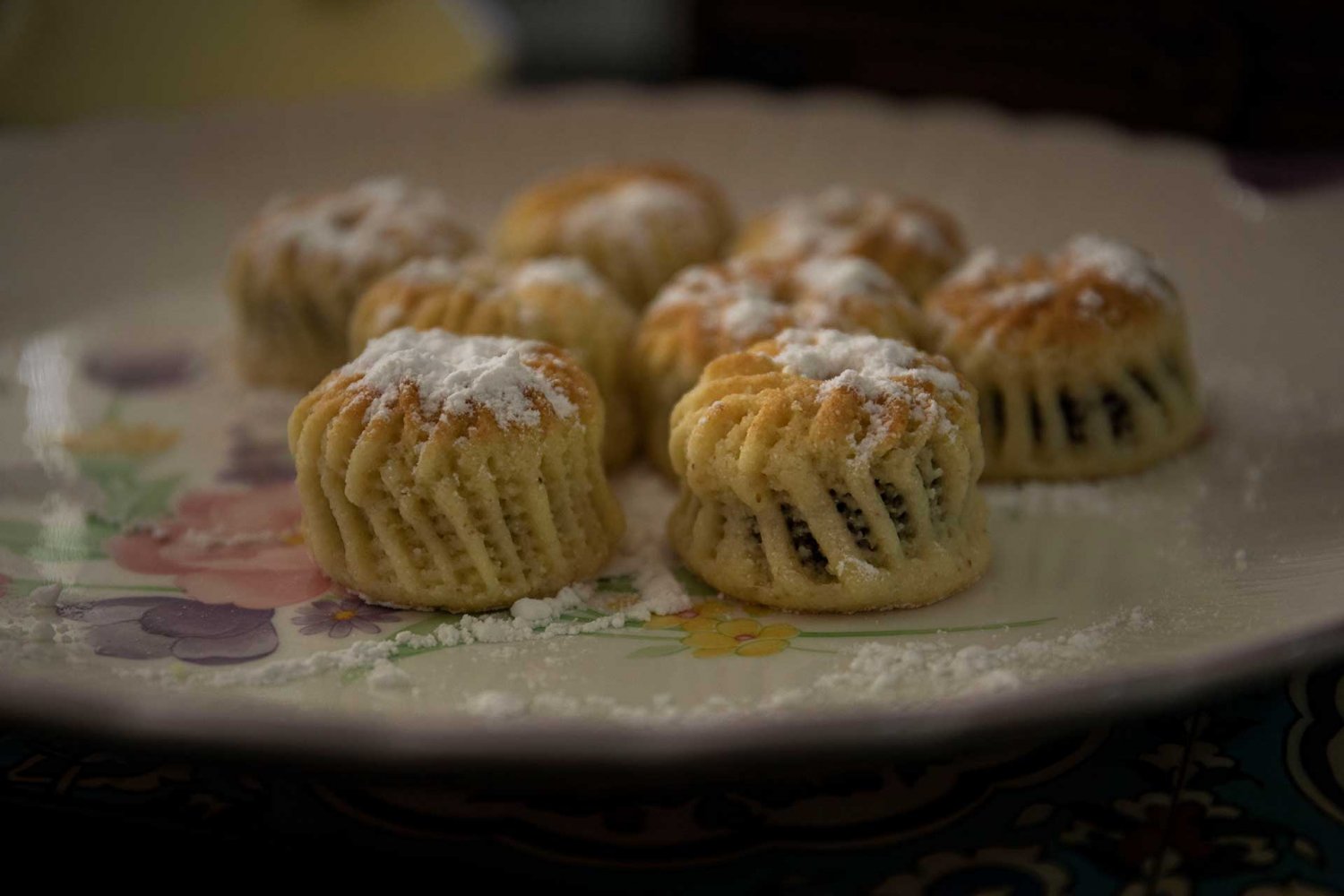 Ma'moul Middle Eastern pastries are stuffed with dates and dusted with powdered sugar