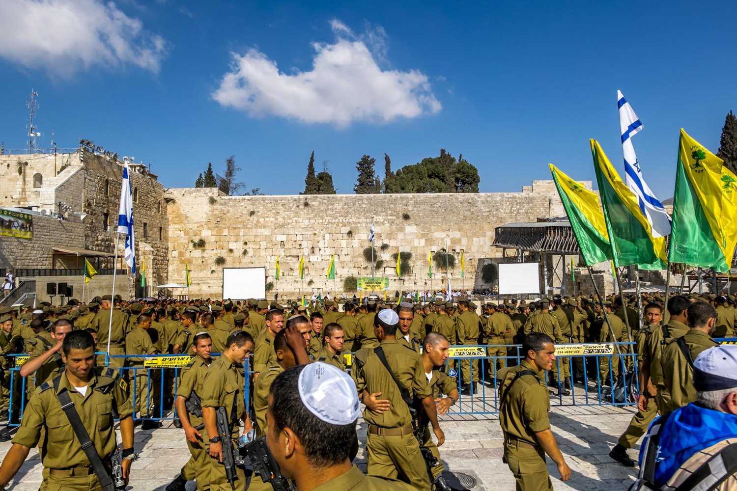 A combat unit of Israeli soldiers being sworn in at the Western Wall Plaza, 2014