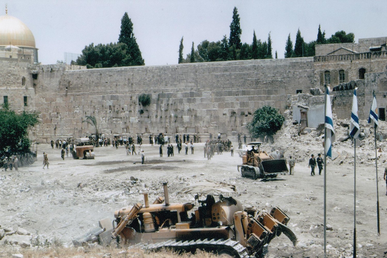 Israeli bulldozers clear the rubble of the remains of the Moroccan Quarter, June 1967