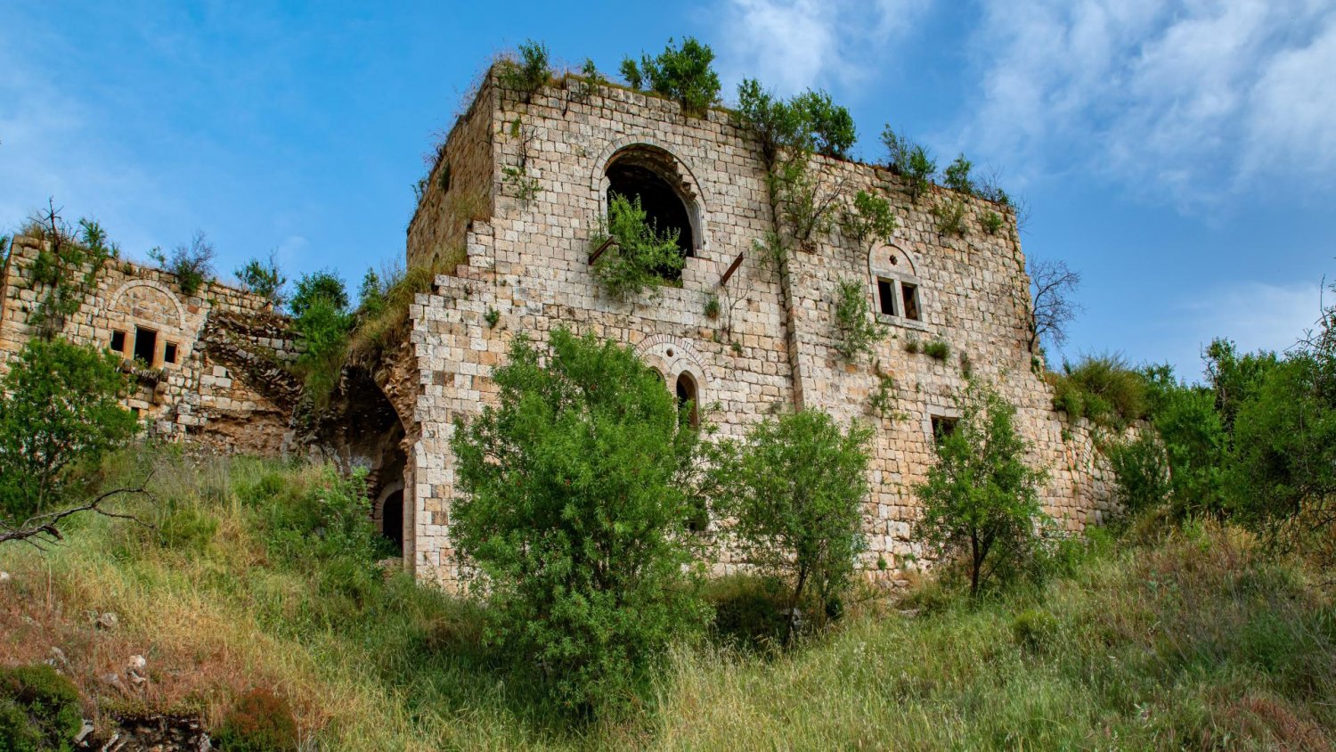 The structures of the Palestinian village of Lifta are not maintained, but remain standing despite its depopulation in 1948
