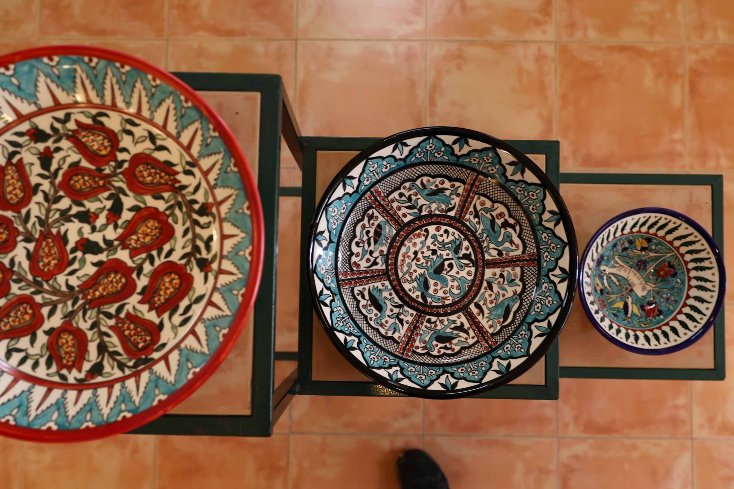 Finished hand-painted Armenian ceramic art pieces on display in the Balian shop in East Jerusalem 