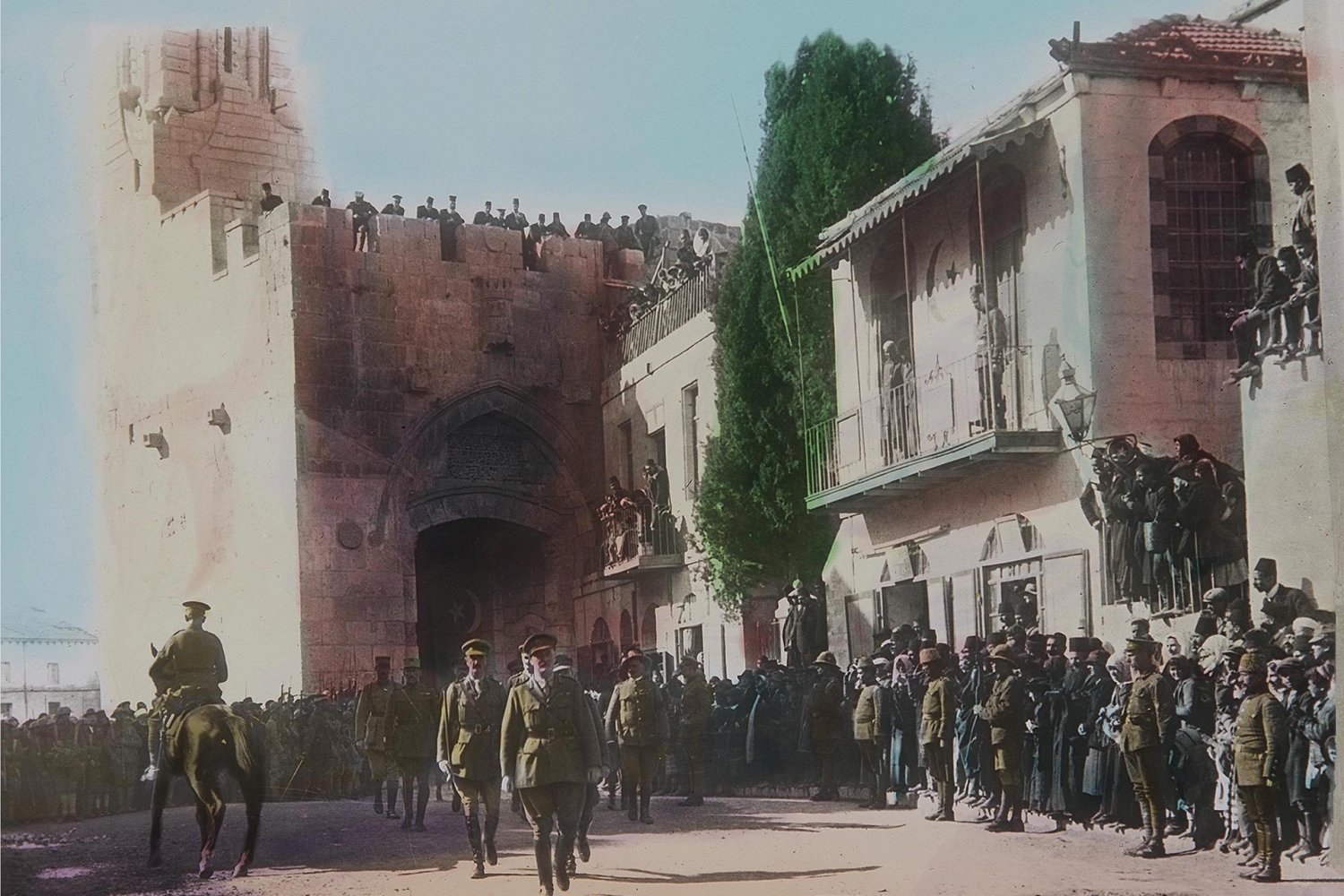 British General Edmund Allenby enters Jerusalem's Old City through Jaffa Gate, marking British victory over the Ottoman empire in 1917. 