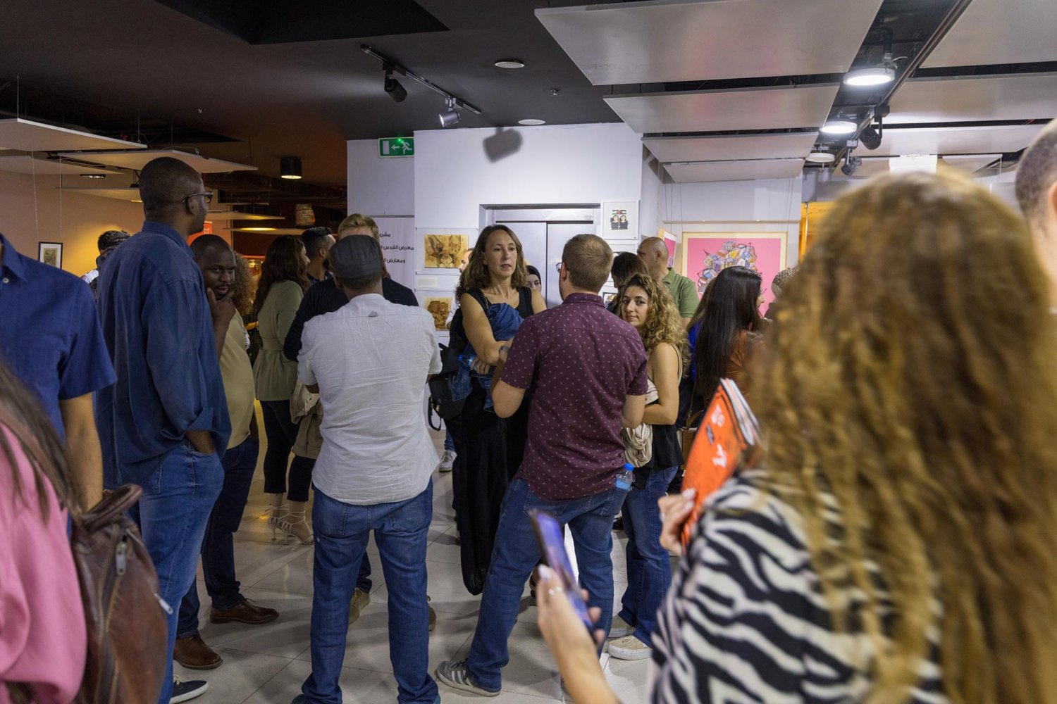 Attendees enjoy the “Swarm” exhibit that ran in conjunction with a music festival in Jerusalem on September 16–21, 2022.